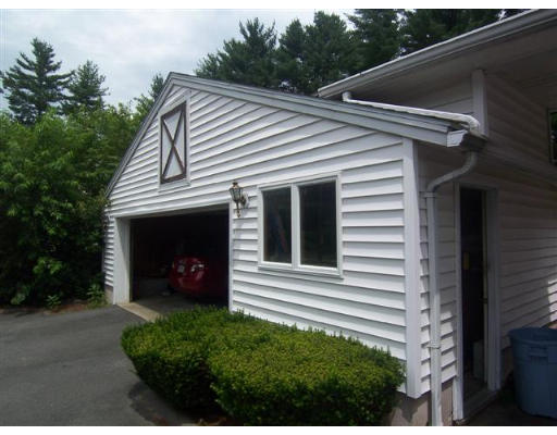 16 Governor Fuller Road Billerica, MA 01821 - Photo 21 of 21 a view of a house with a yard and garage