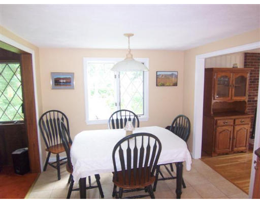 16 Governor Fuller Road Billerica, MA 01821 - Photo 10 of 21 a view of a dining room with furniture window and wooden floor
