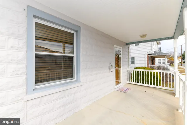 a view of livingroom with deck and furniture