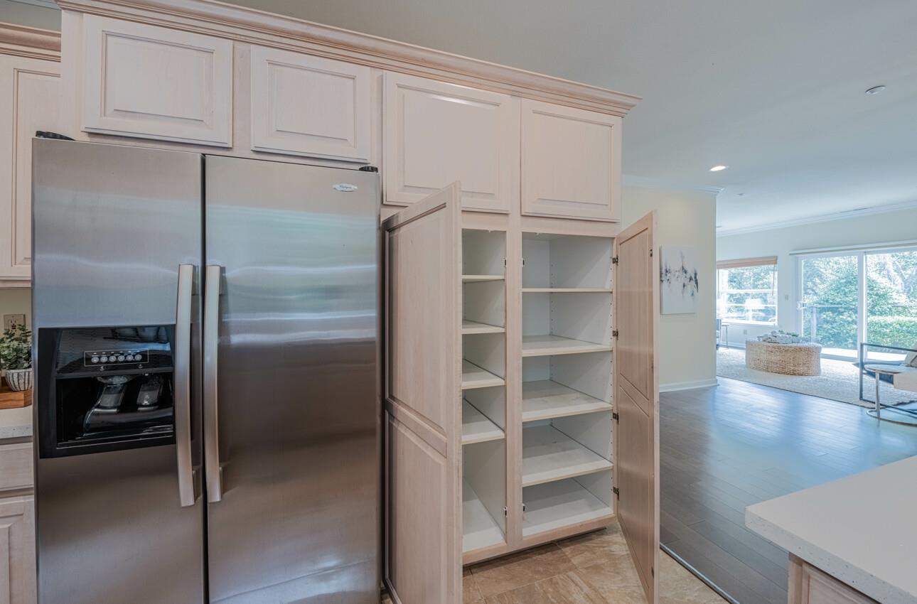 840 Seacliff Drive Aptos, CA 95003 - Photo 16 of 58 a kitchen with cabinets and a refrigerator