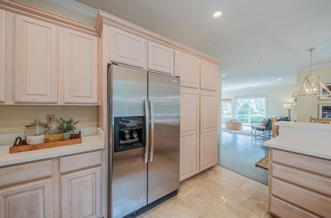 840 Seacliff Drive Aptos, CA 95003 - Photo 17 of 58 a kitchen with a refrigerator and white cabinets