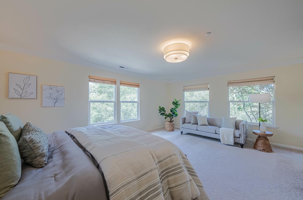 840 Seacliff Drive Aptos, CA 95003 - Photo 26 of 58 a bed room with a bed and a couch