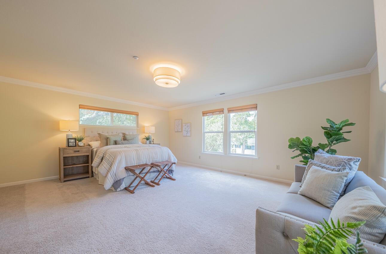 840 Seacliff Drive Aptos, CA 95003 - Photo 27 of 58 a bed room with a bed and a couch