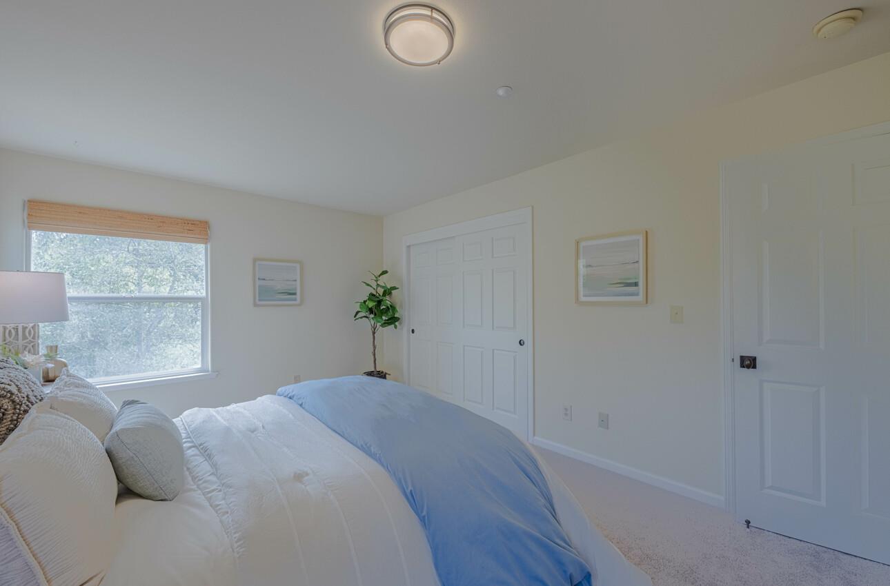 840 Seacliff Drive Aptos, CA 95003 - Photo 37 of 58 a bedroom with a bed and a window
