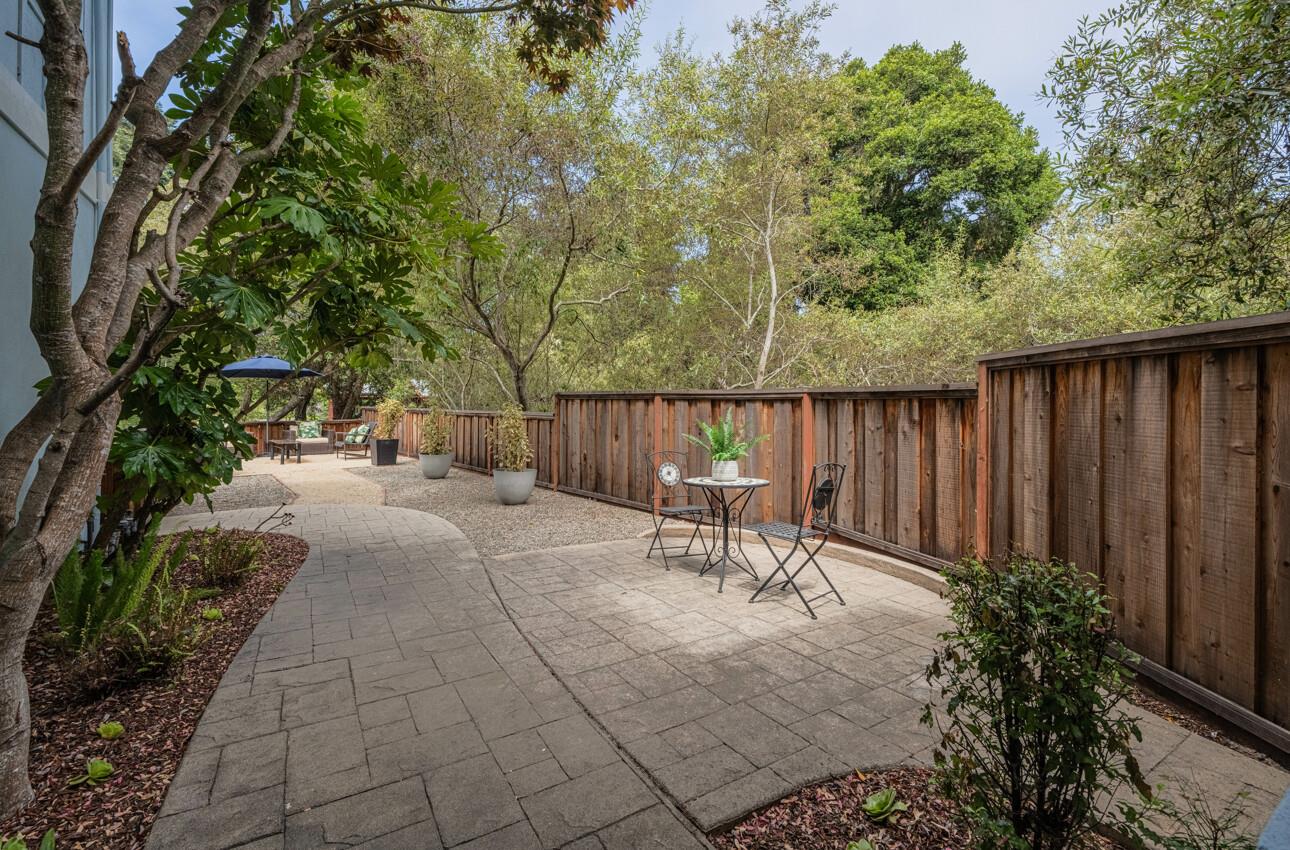 840 Seacliff Drive Aptos, CA 95003 - Photo 4 of 58 a view of backyard with a table and chairs in patio