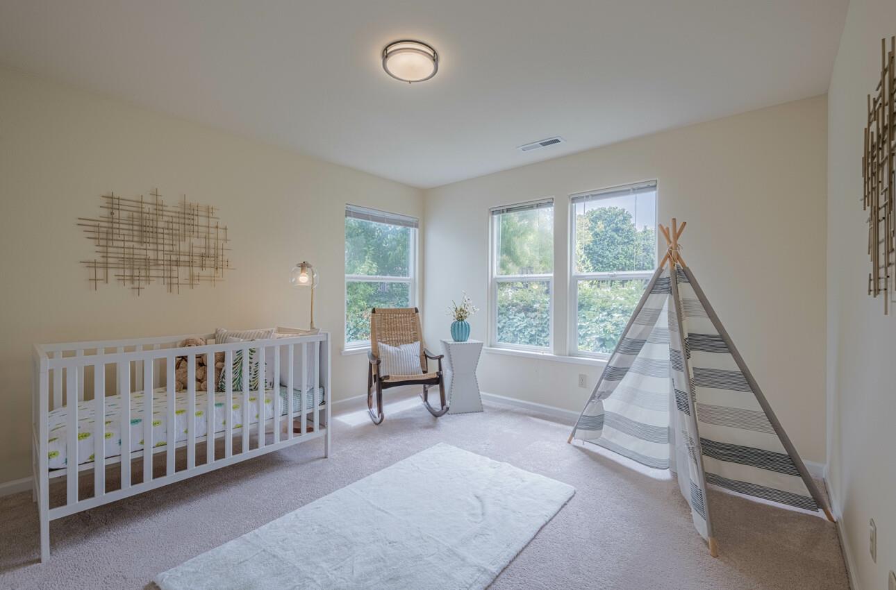 840 Seacliff Drive Aptos, CA 95003 - Photo 41 of 58 a living room with furniture and a large window
