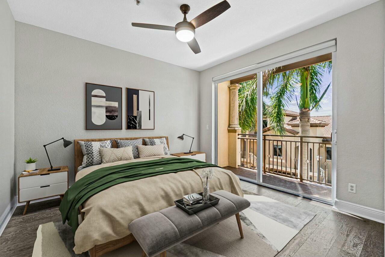 3016 Waterside Circle Boynton Beach, FL 33435 - Photo 21 of 50 a bedroom with a bed and glass window