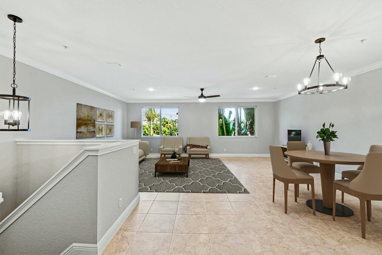 3016 Waterside Circle Boynton Beach, FL 33435 - Photo 4 of 50 a living room with furniture and a chandelier