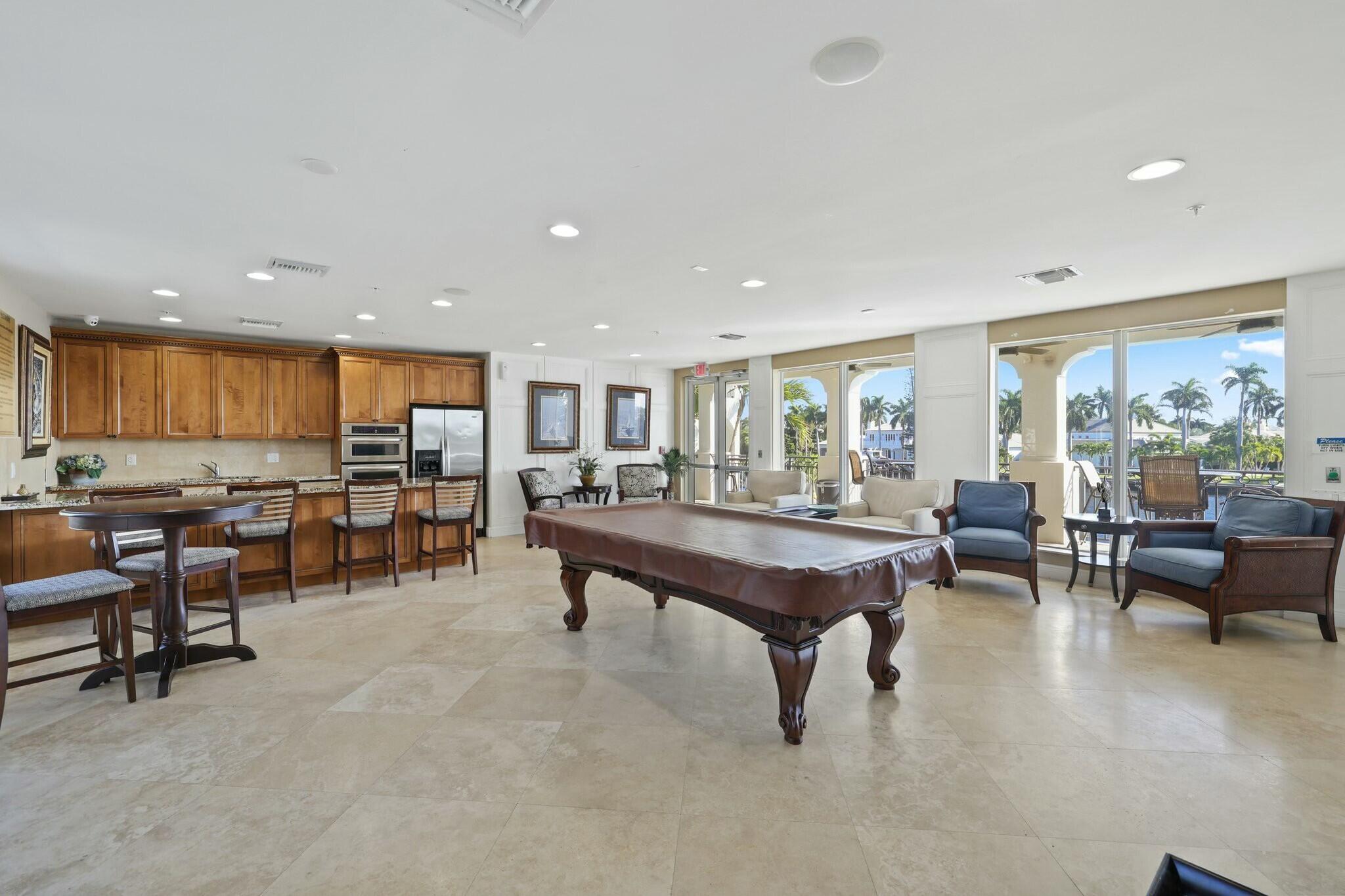 3016 Waterside Circle Boynton Beach, FL 33435 - Photo 42 of 50 a living room with furniture and a table