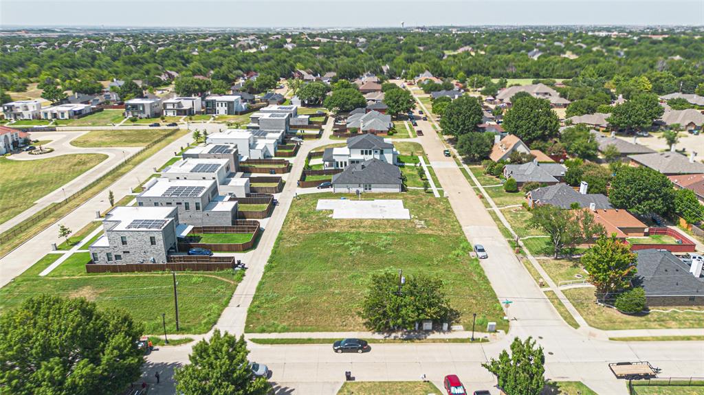 9749 Williford Trail Frisco, TX 75033 - Photo 14 of 30 an aerial view of residential houses with outdoor space and swimming pool