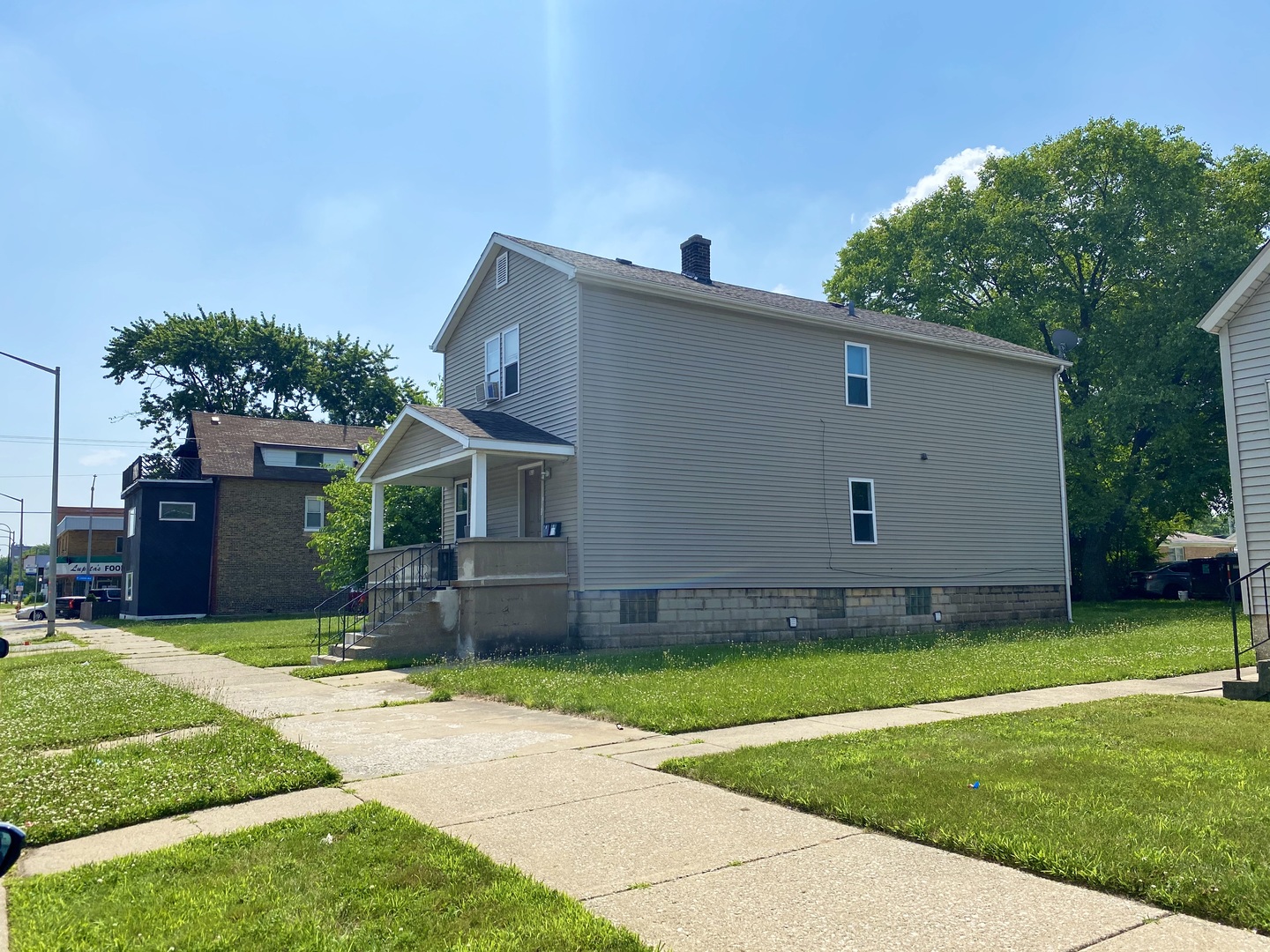 311 Pulaski Road Calumet City, IL 60409 - Photo 3 of 16 a view of a backyard with a garden