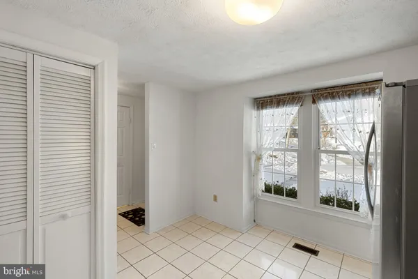 a view of an empty room with window