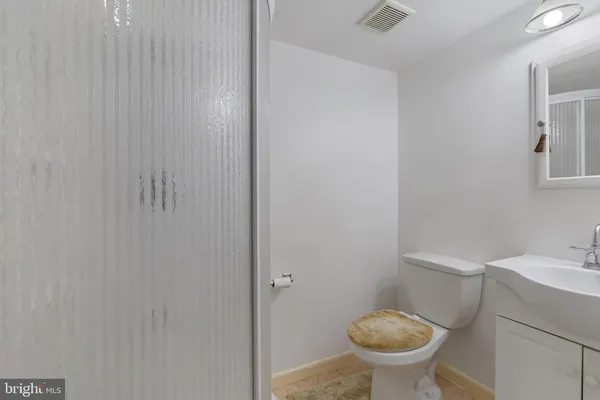 a bathroom with a sink and a toilet