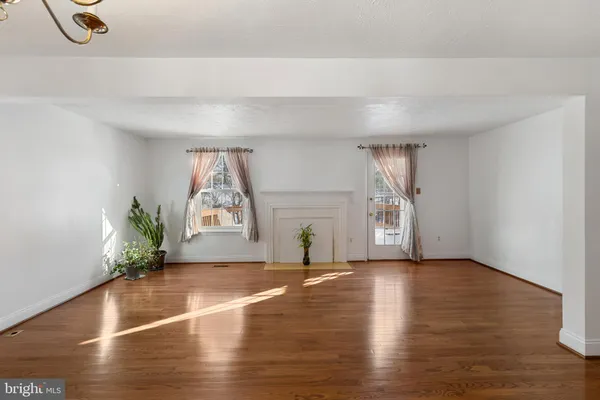 a view of a livingroom with wooden floor