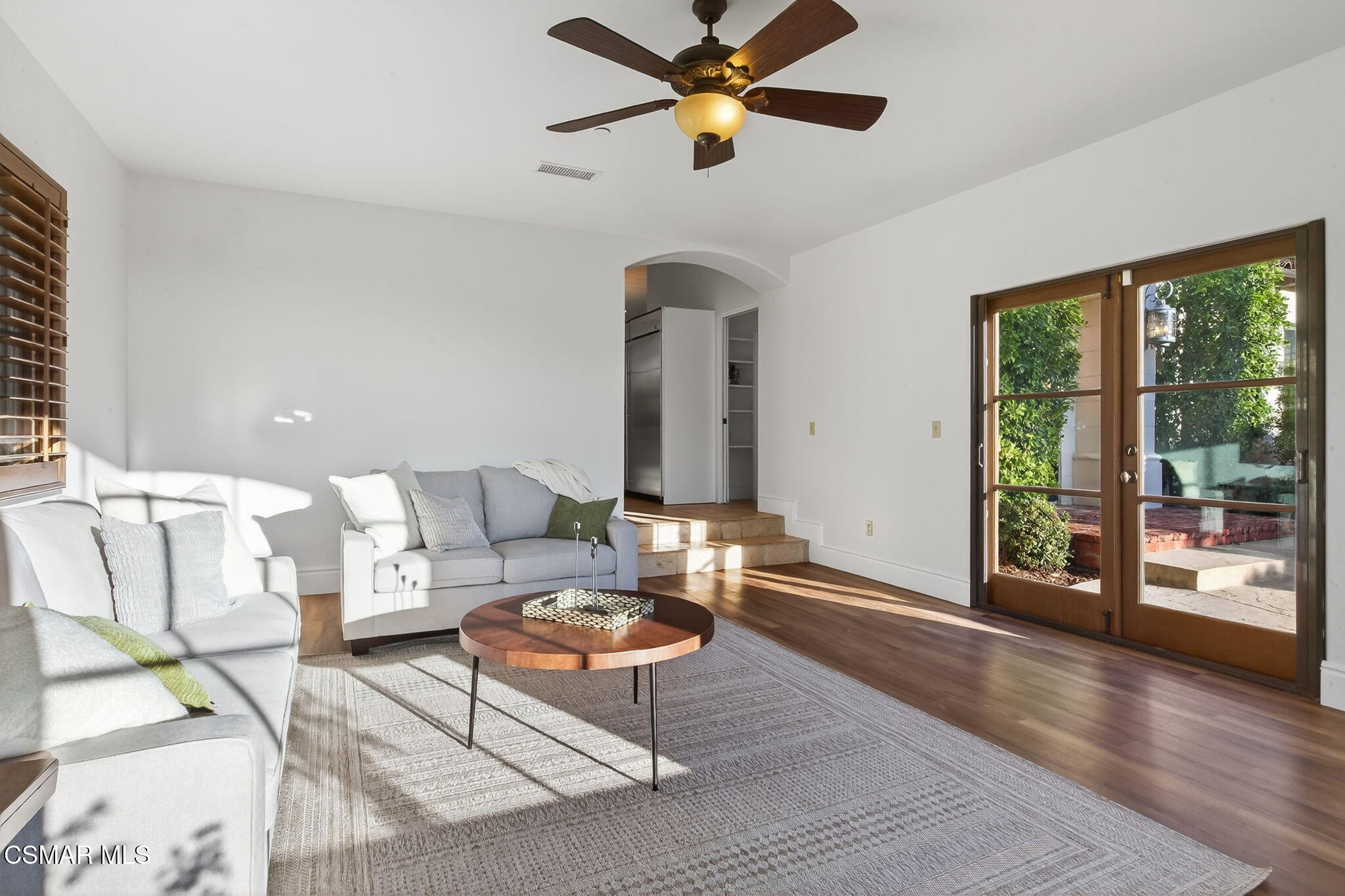 1560 Goodenough Road Fillmore, CA 93015 - Photo 24 of 81 a living room with furniture large window and wooden floor
