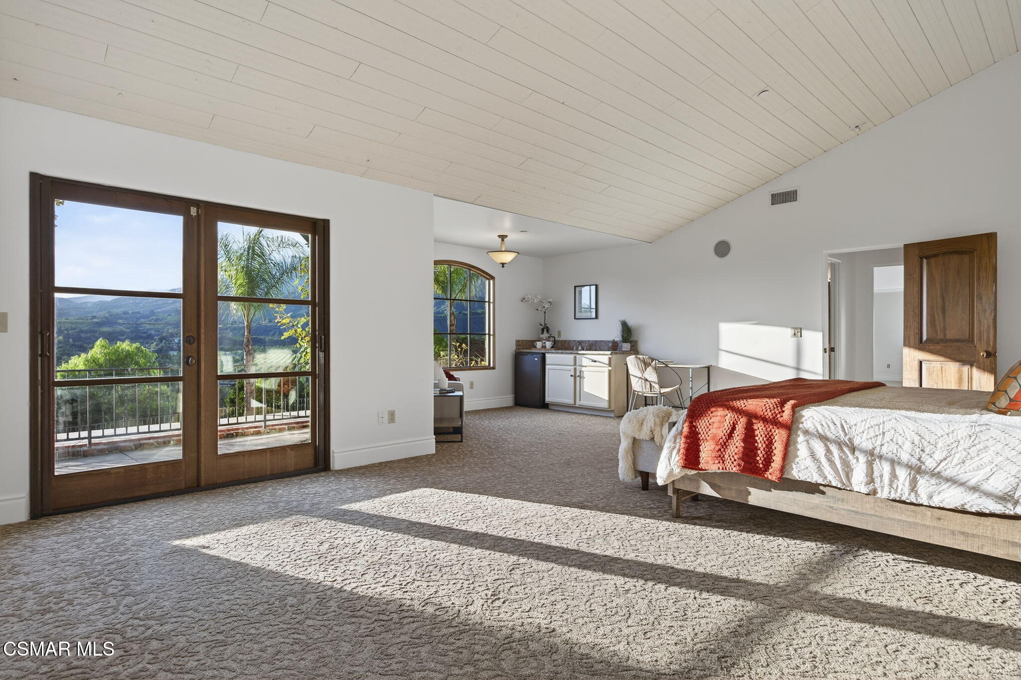 1560 Goodenough Road Fillmore, CA 93015 - Photo 27 of 81 a bedroom with a large bed and a window