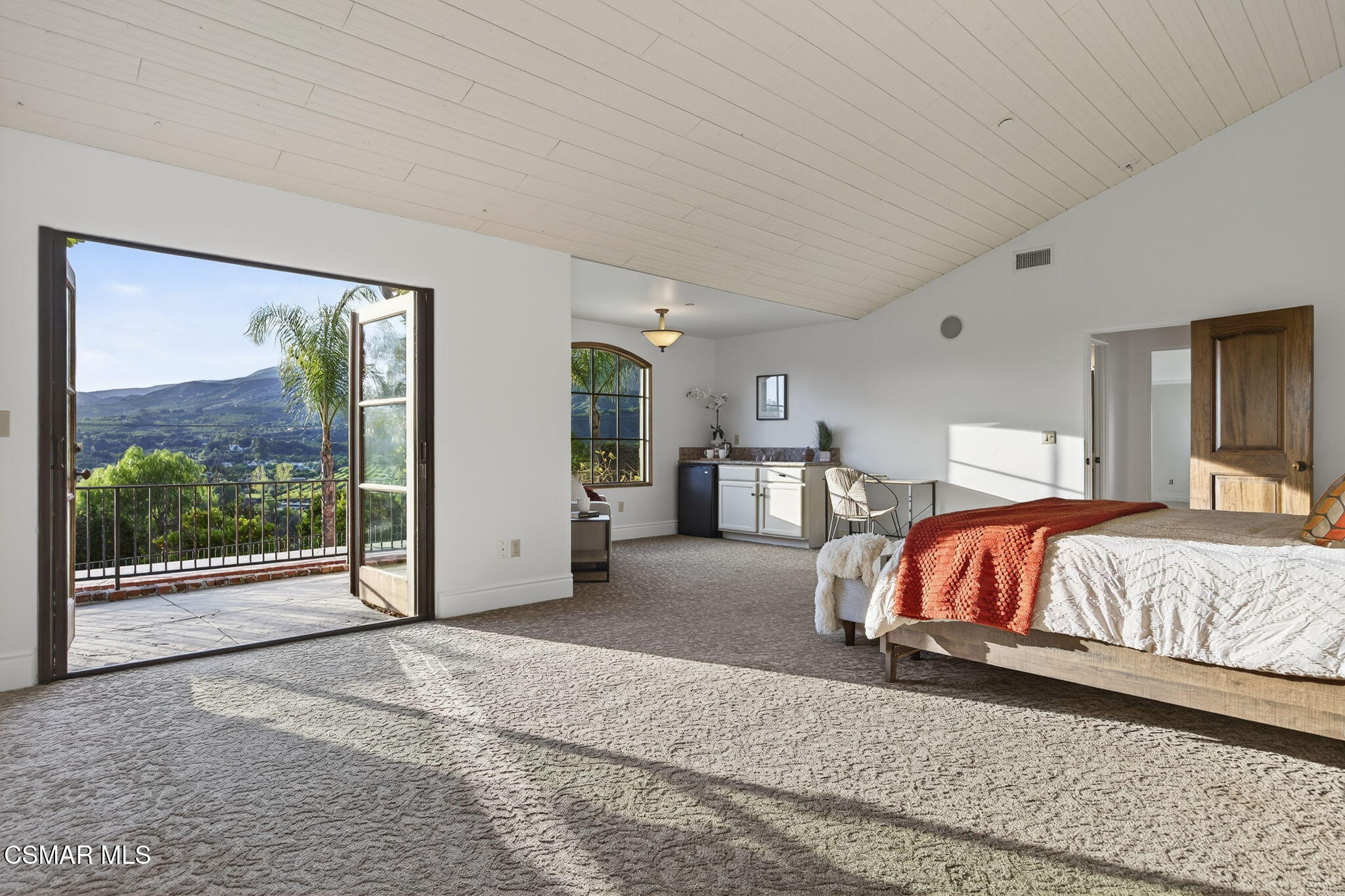 1560 Goodenough Road Fillmore, CA 93015 - Photo 28 of 81 a bedroom with a large bed and a large window