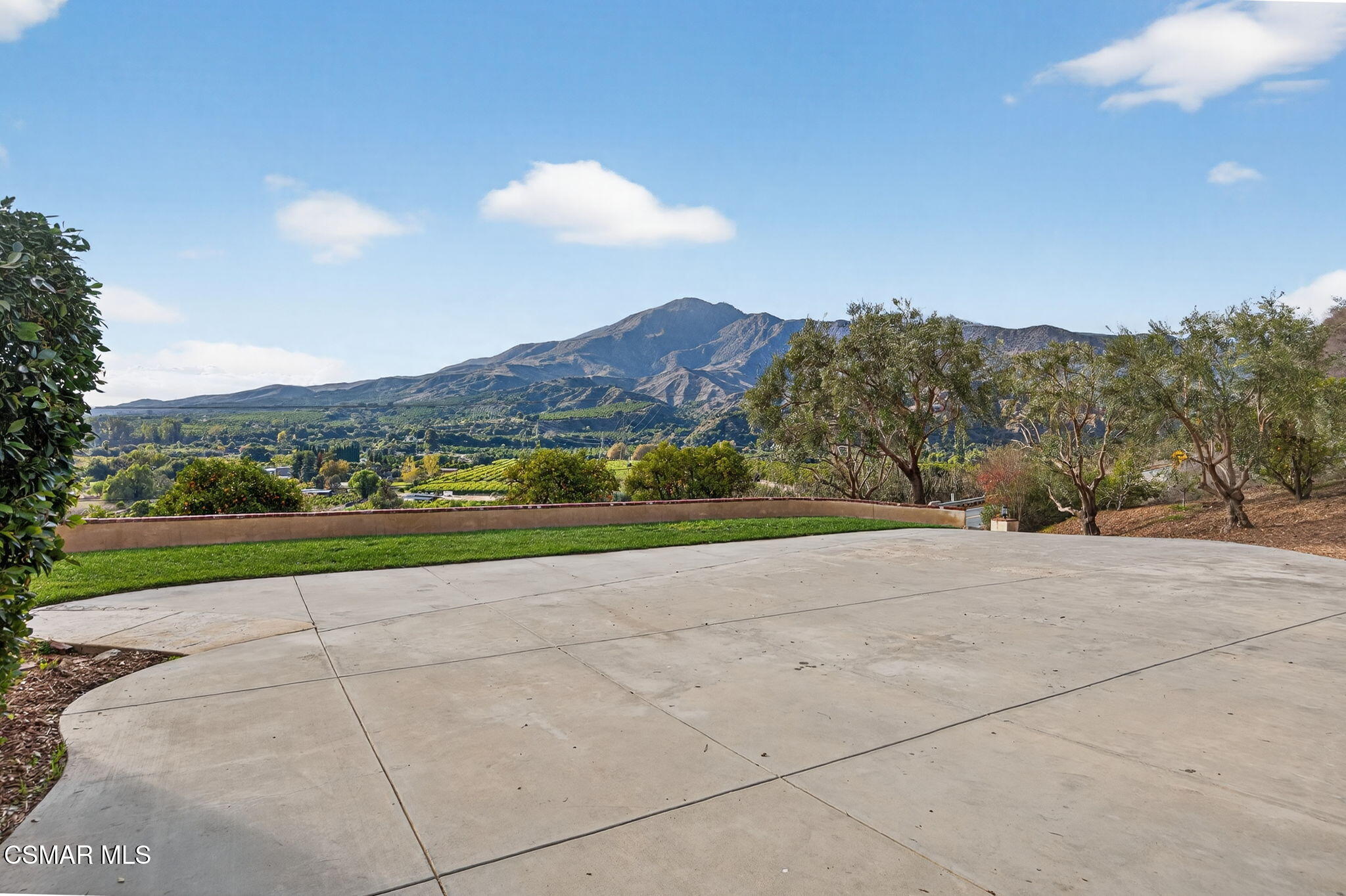 1560 Goodenough Road Fillmore, CA 93015 - Photo 66 of 81 a view of a house with a yard and mountain view