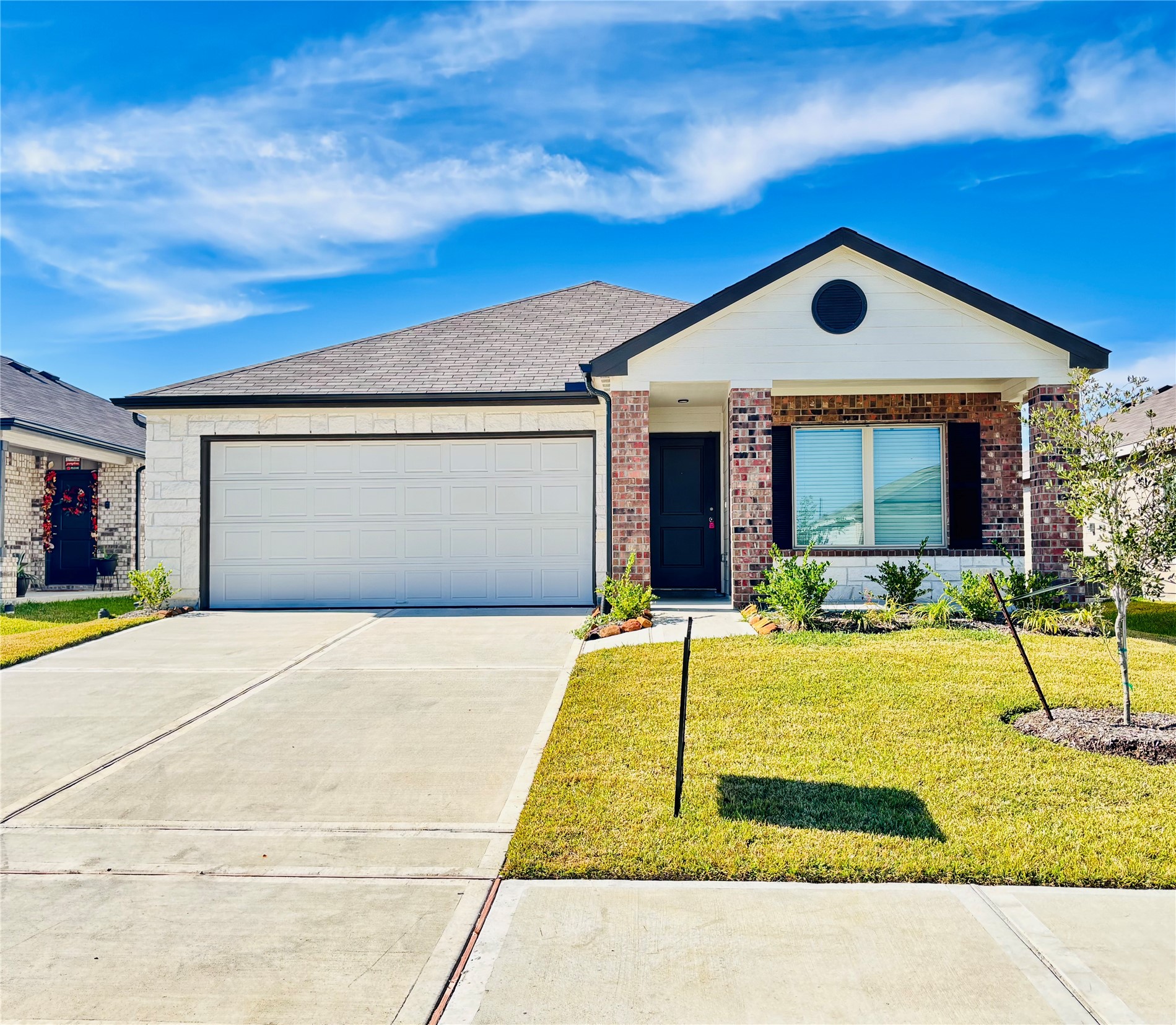 a front view of house with garage