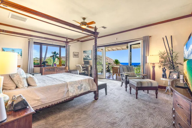 a bedroom with a bed window and walk in closet