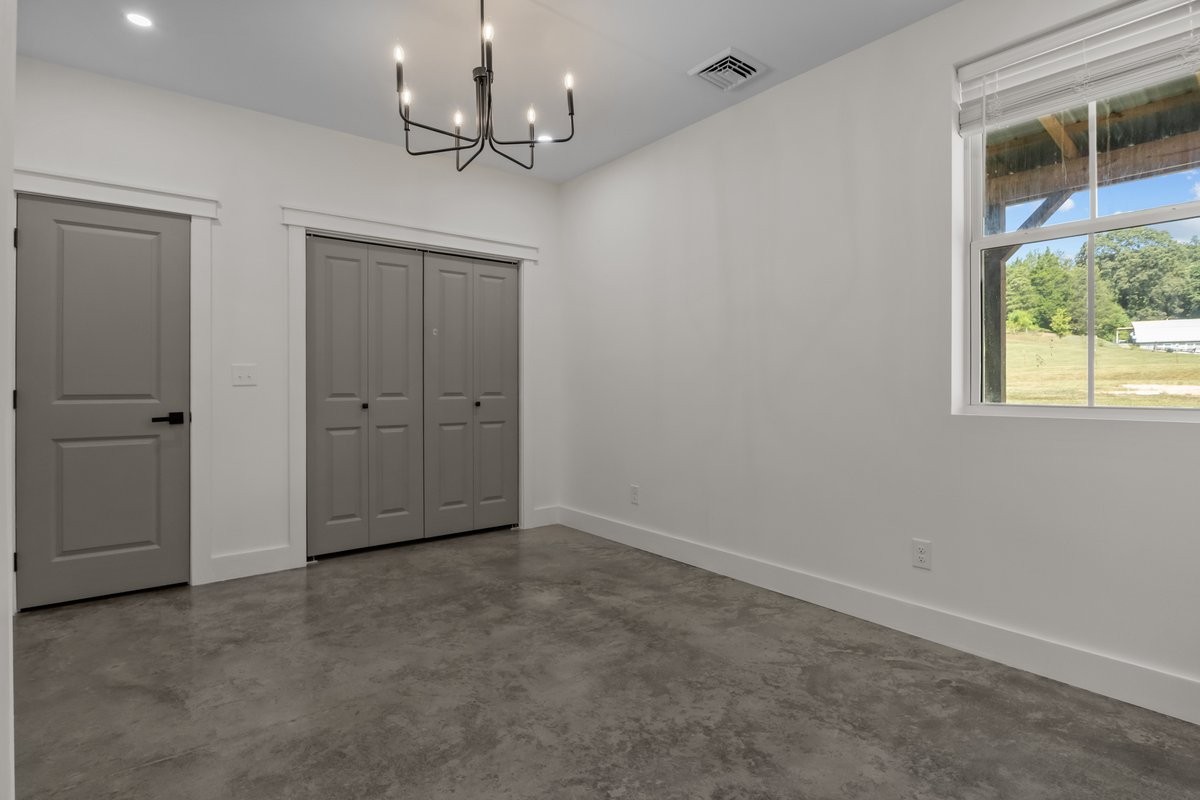 6405 Clydeton Road Waverly, TN 37185 - Photo 7 of 11 a view of an empty room with a window