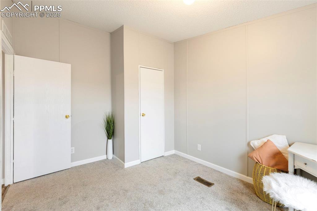 15345 Trigger Road Peyton, CO 80831 - Photo 20 of 26 a view of a room with an empty space