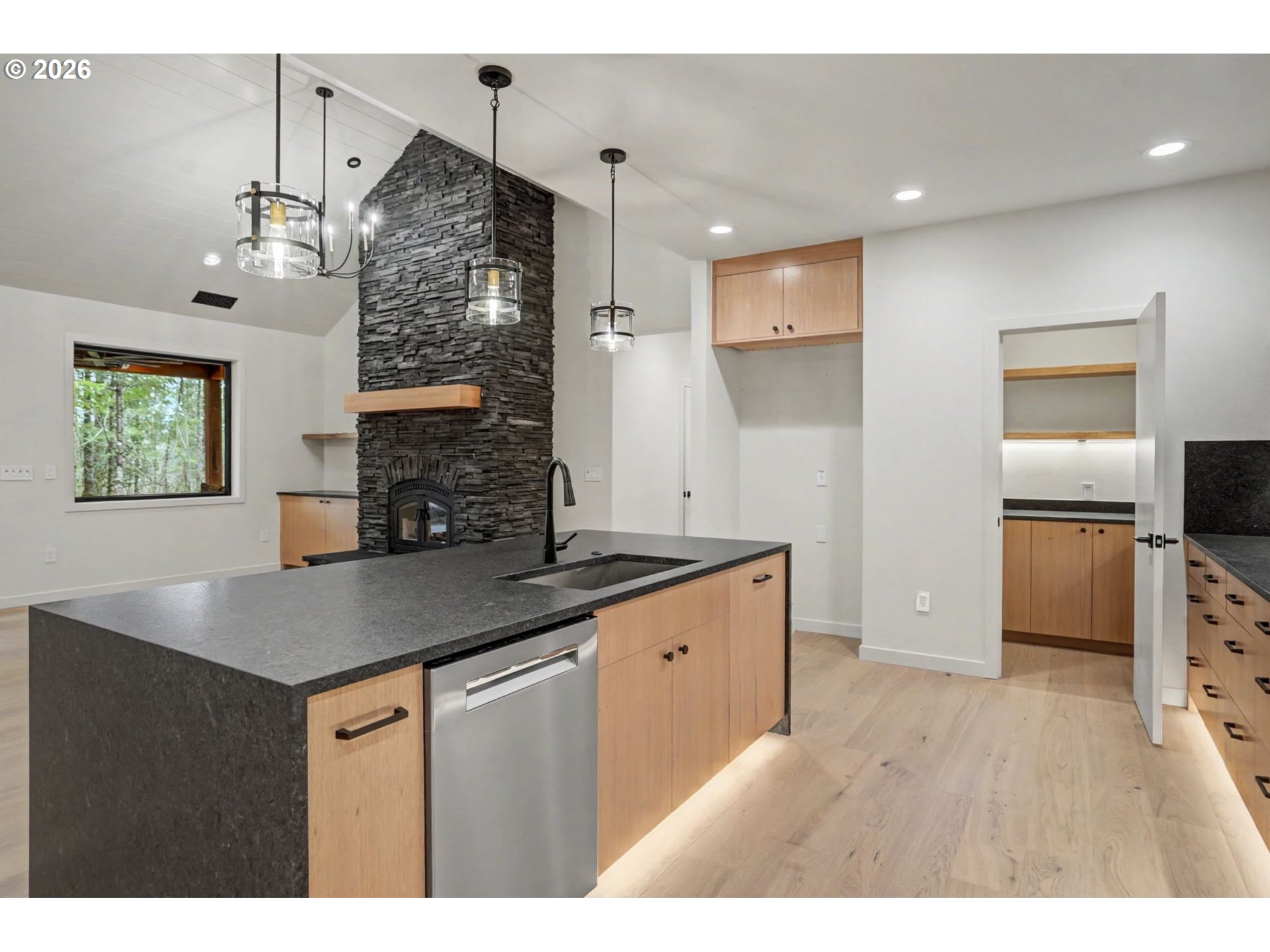 19850 Winters Hill Road Southeast Silverton, OR 97381 - Photo 14 of 48 a kitchen with stainless steel appliances granite countertop a sink refrigerator and cabinets