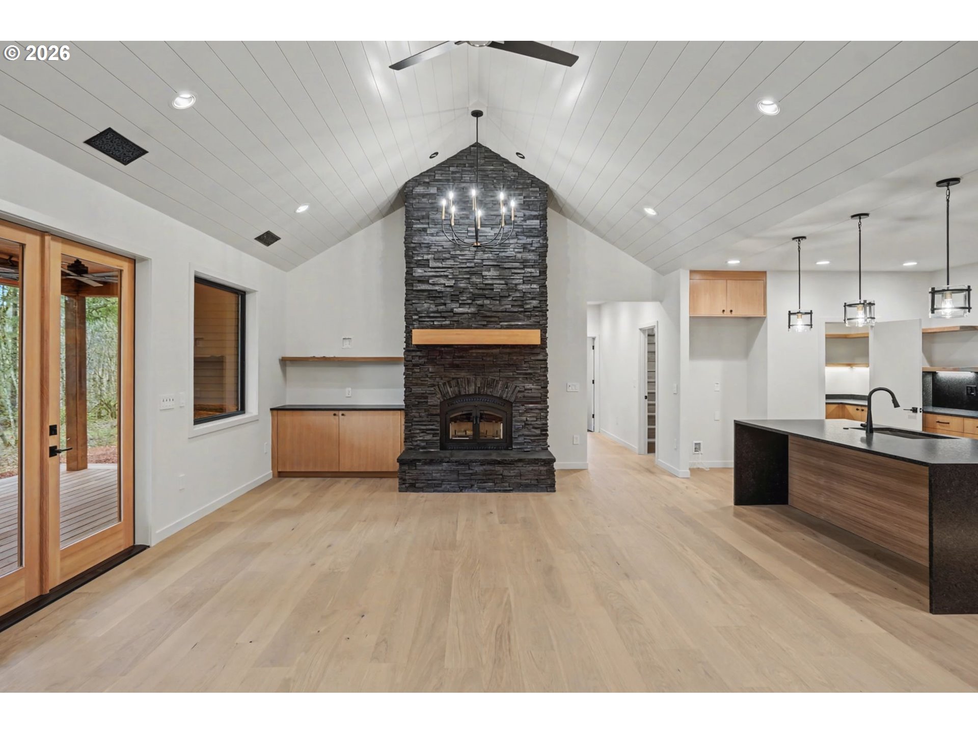 19850 Winters Hill Road Southeast Silverton, OR 97381 - Photo 17 of 48 a view of a living room with furniture and a fireplace
