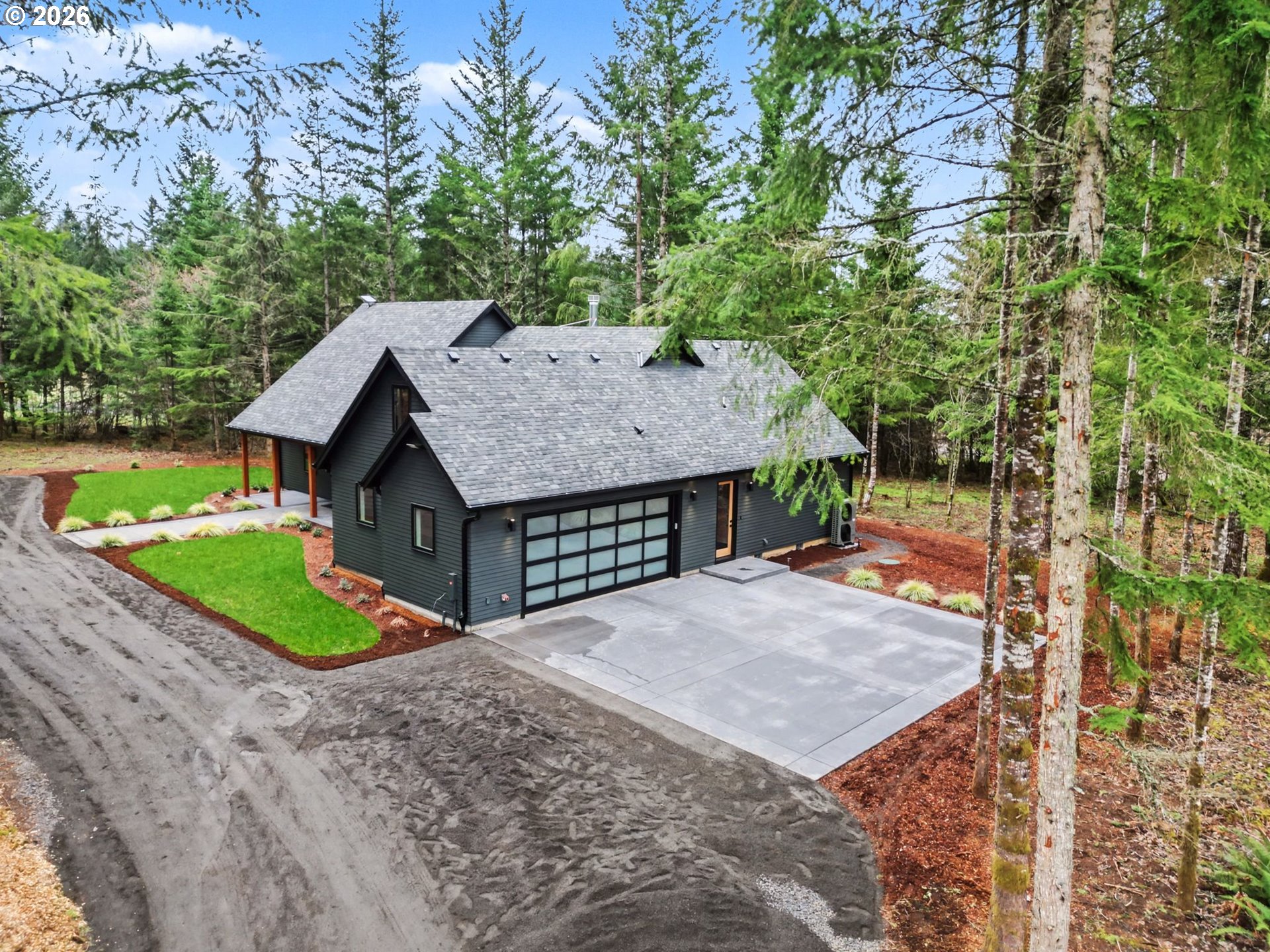 19850 Winters Hill Road Southeast Silverton, OR 97381 - Photo 2 of 48 a view of a house with a yard and garage