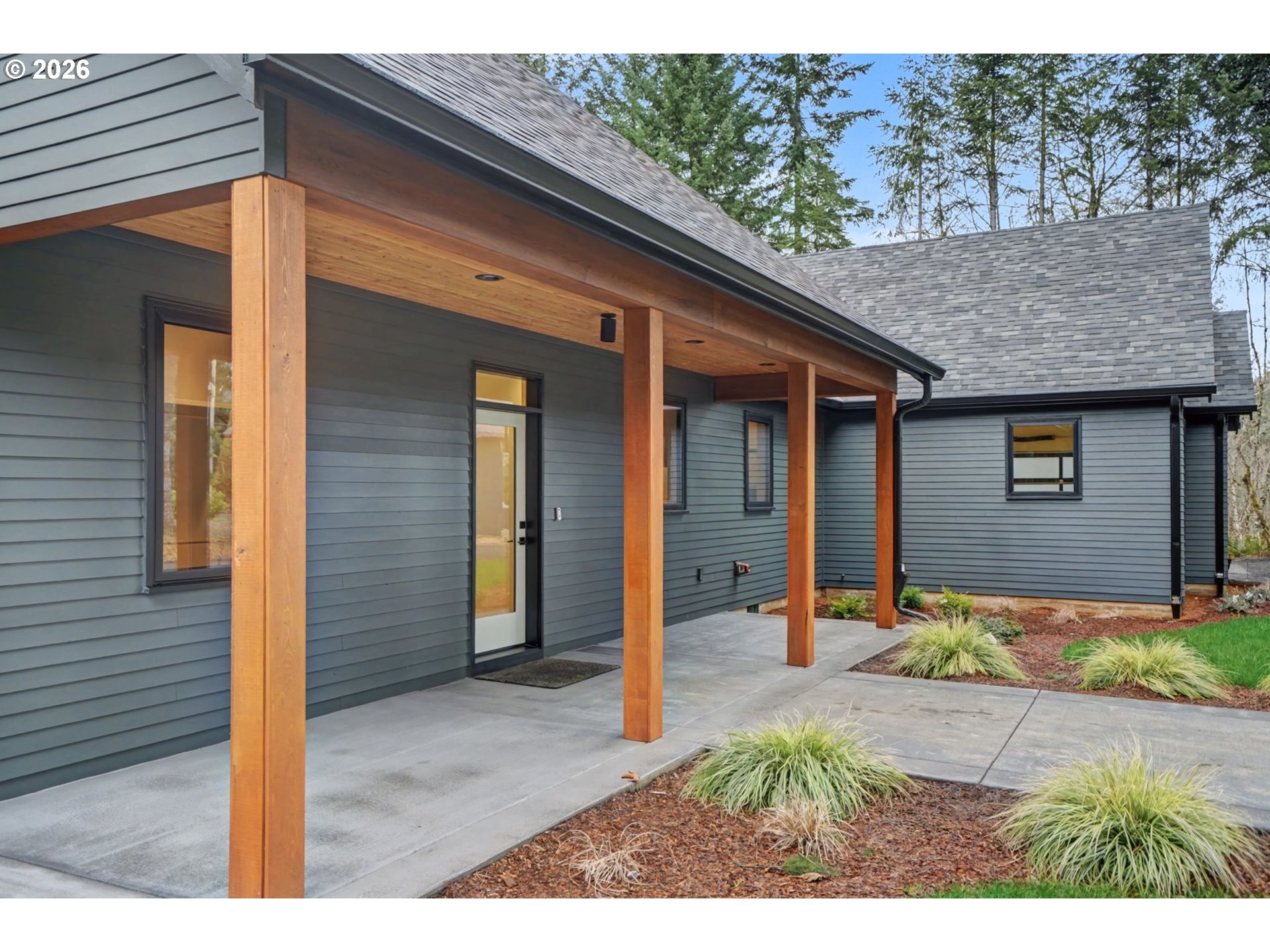 19850 Winters Hill Road Southeast Silverton, OR 97381 - Photo 3 of 48 a backyard of a house with seating space