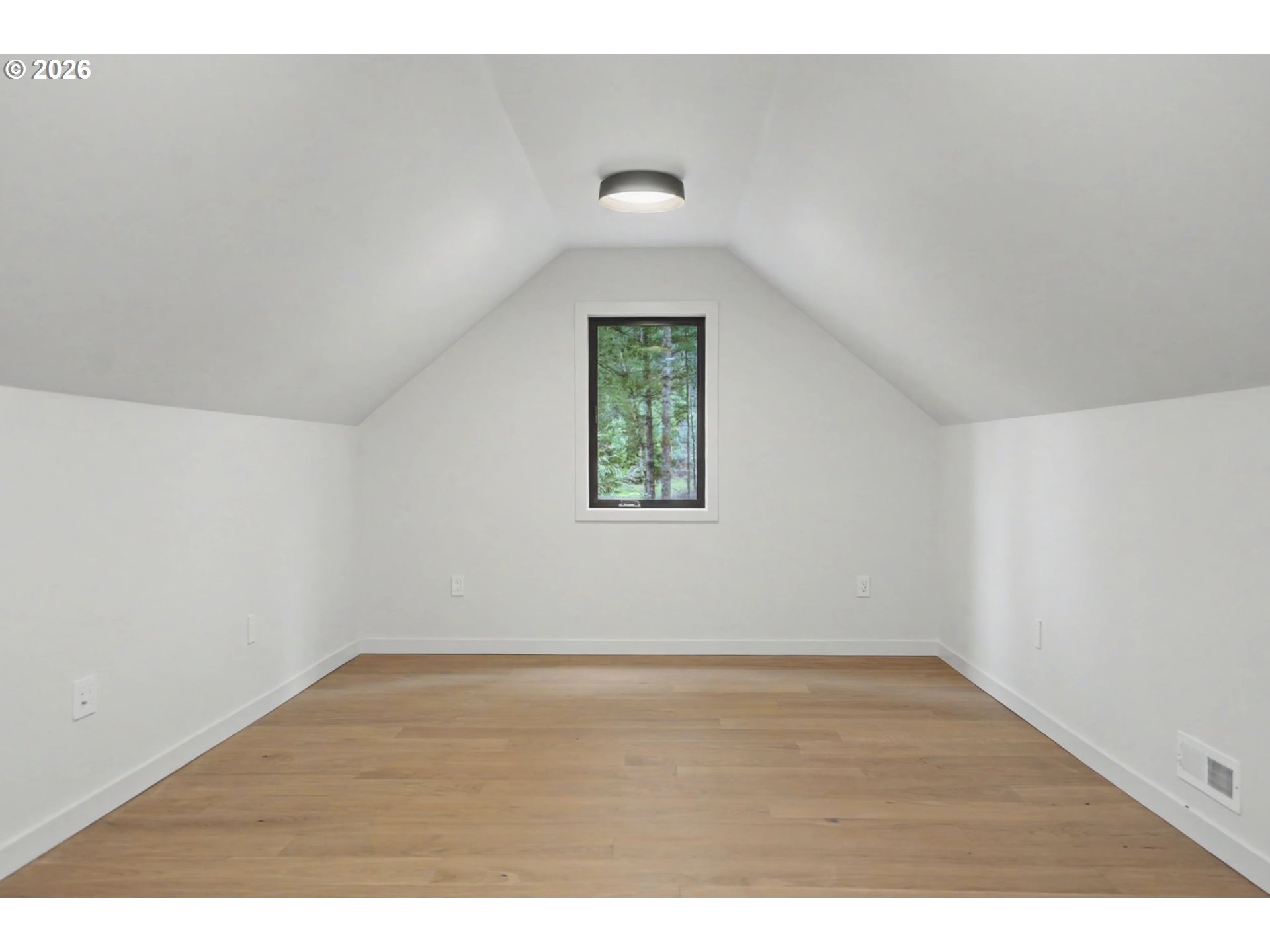 19850 Winters Hill Road Southeast Silverton, OR 97381 - Photo 34 of 48 an empty room with wooden floor cabinet and windows