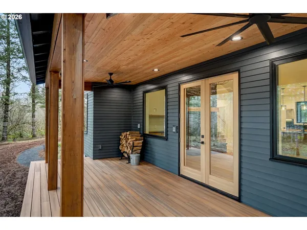 a view of outdoor space and wooden floor