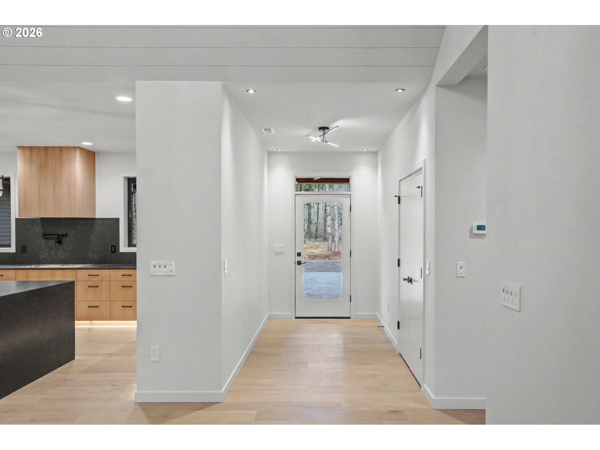 19850 Winters Hill Road Southeast Silverton, OR 97381 - Photo 4 of 48 a open hall with stainless steel appliances granite countertop a refrigerator and a sink