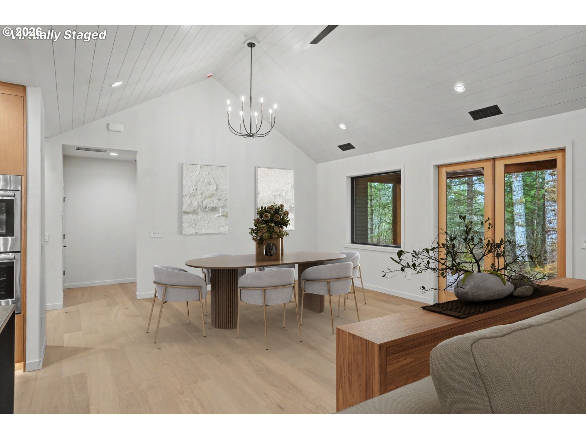 19850 Winters Hill Road Southeast Silverton, OR 97381 - Photo 9 of 48 a view of a dining room with furniture wooden floor and chandelier