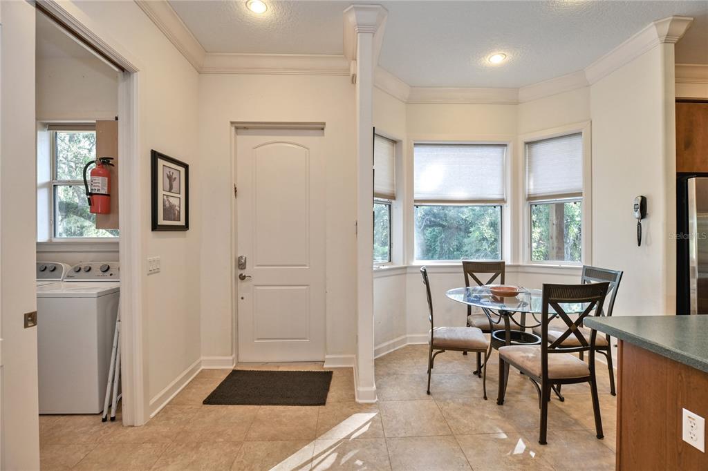 2299 North Bayou Point Inverness, FL 34453 - Photo 15 of 64 a view of a dining room with furniture and a window