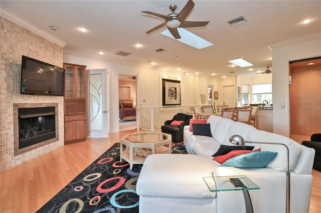 2299 North Bayou Point Inverness, FL 34453 - Photo 19 of 64 a living room with furniture and a flat screen tv