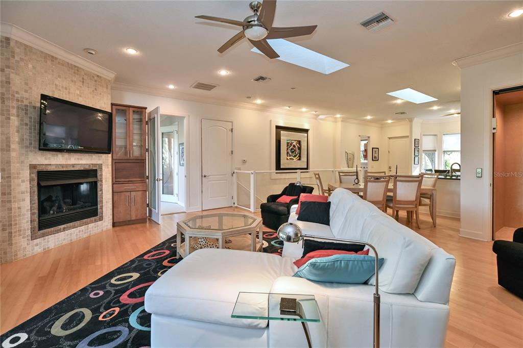 2299 North Bayou Point Inverness, FL 34453 - Photo 24 of 64 a living room with furniture and a flat screen tv