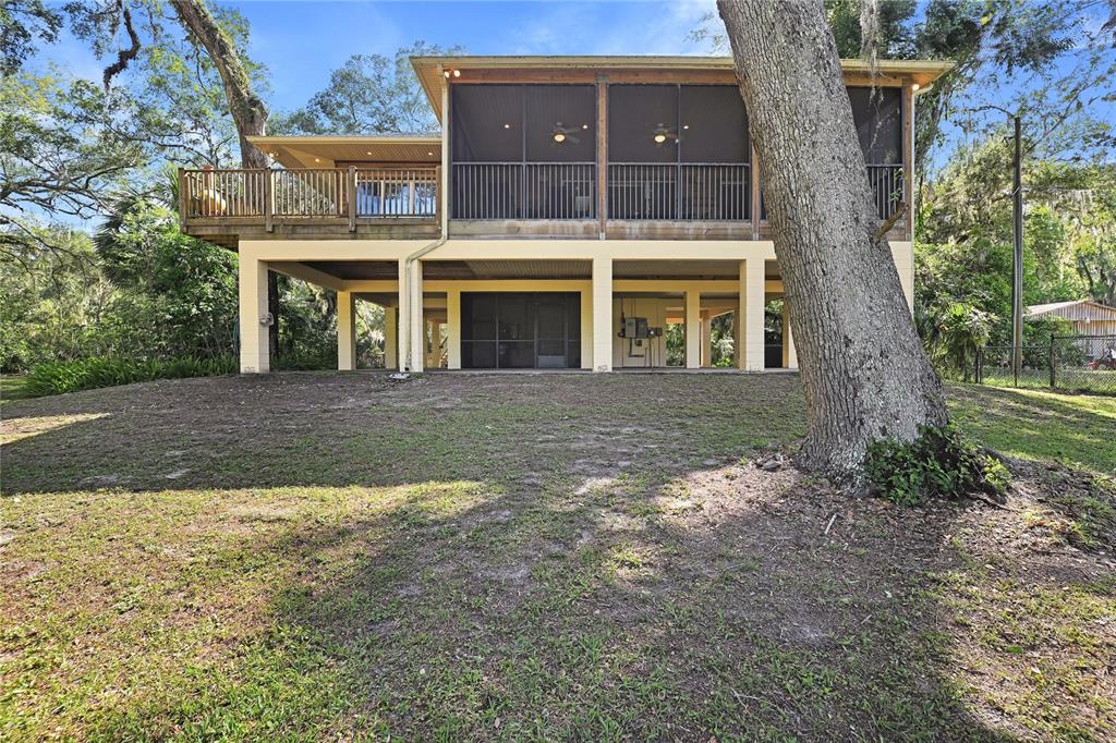 2299 North Bayou Point Inverness, FL 34453 - Photo 43 of 64 a front view of a house with a yard