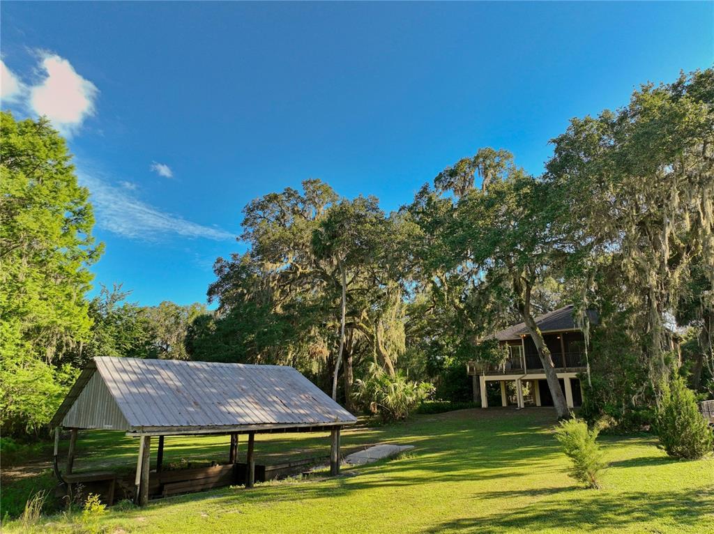 2299 North Bayou Point Inverness, FL 34453 - Photo 48 of 64 a view of a house with a big yard