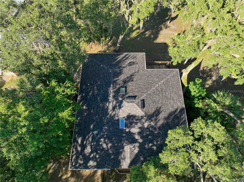 2299 North Bayou Point Inverness, FL 34453 - Photo 51 of 64 an aerial view of a house with a yard