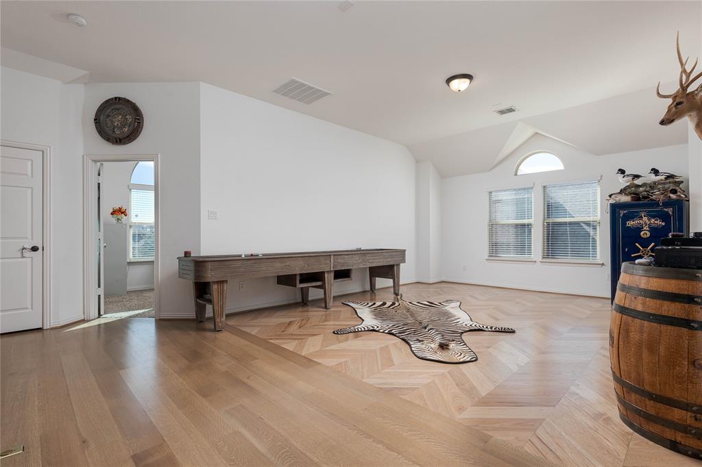 1008 Hummingbird Court Forney, TX 75126 - Photo 19 of 34 a view of a livingroom with furniture and window