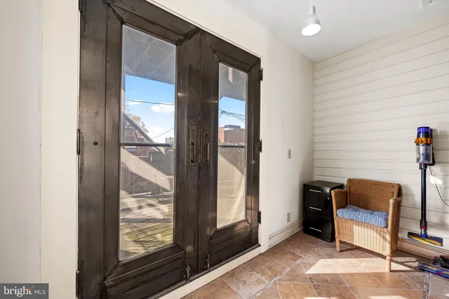 a view of a dining room with wooden floor