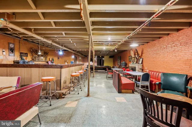 a view of a chairs and table in a patio