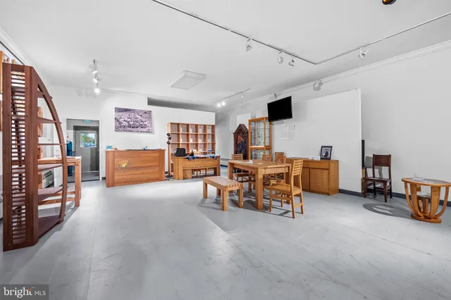 a bedroom with a bed and a closet