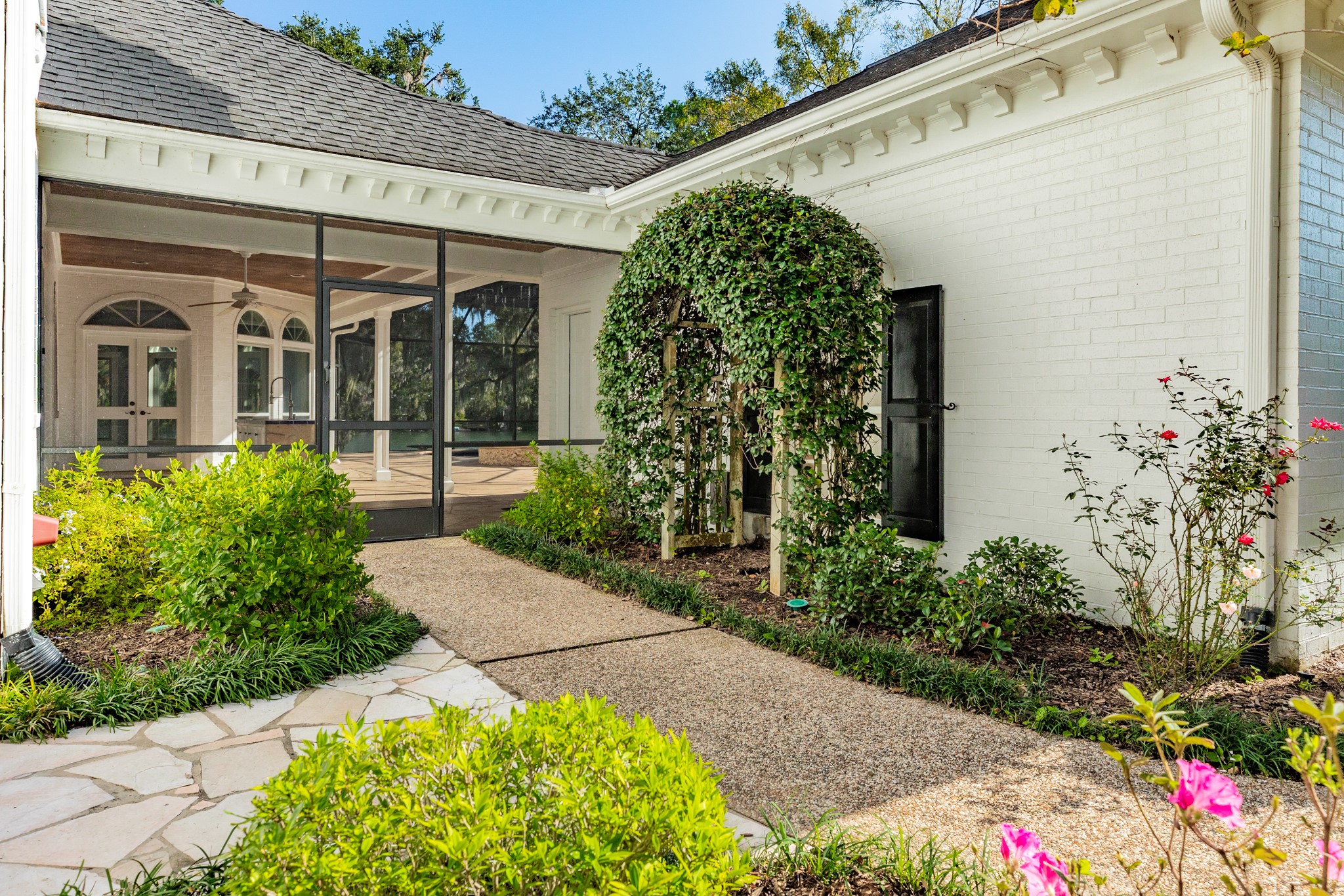 3 Bayou Road Lake Jackson, TX 77566 - Photo 16 of 50 a front view of a house with garden