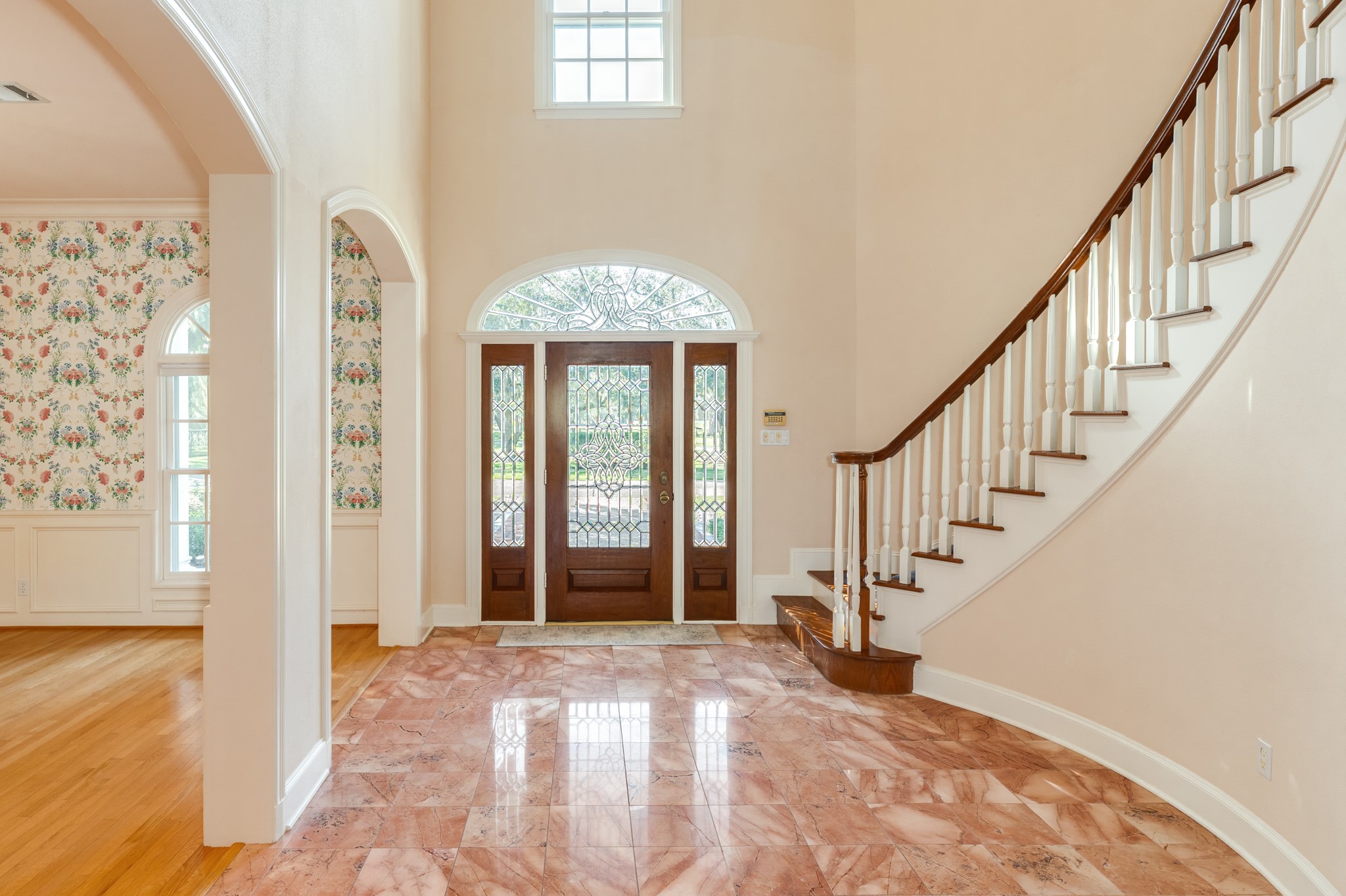 3 Bayou Road Lake Jackson, TX 77566 - Photo 19 of 50 a view of an entryway with wooden floor and windows