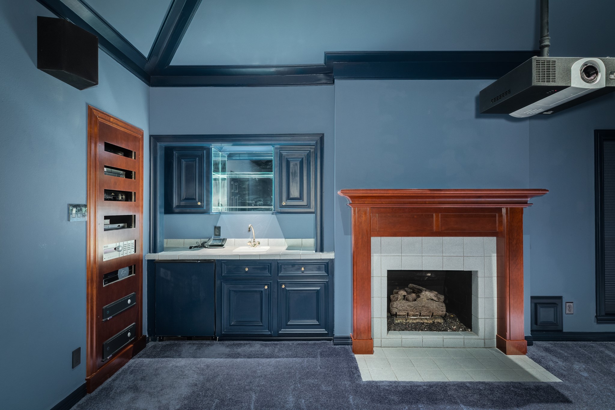 3 Bayou Road Lake Jackson, TX 77566 - Photo 34 of 50 a room with a fireplace and a sink