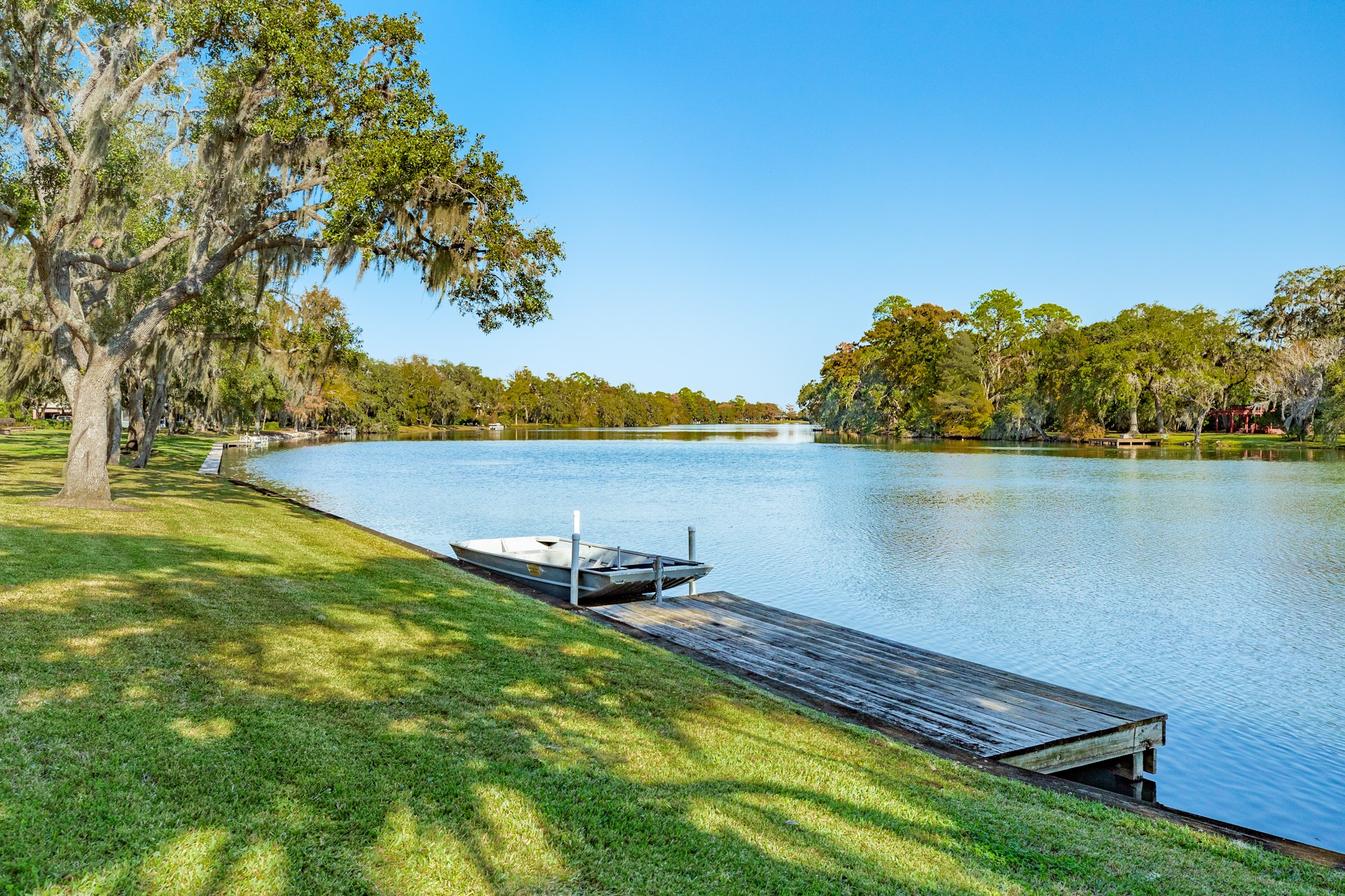 3 Bayou Road Lake Jackson, TX 77566 - Photo 7 of 50 a view of a lake with houses in the back