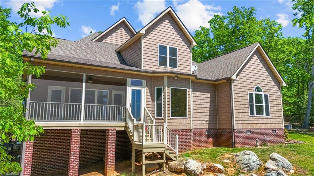 848 Sierra Trace Road Denton, NC 27239 - Photo 2 of 47 Well-positioned home with scenic surroundings and access to the spacious screened-in porch.
