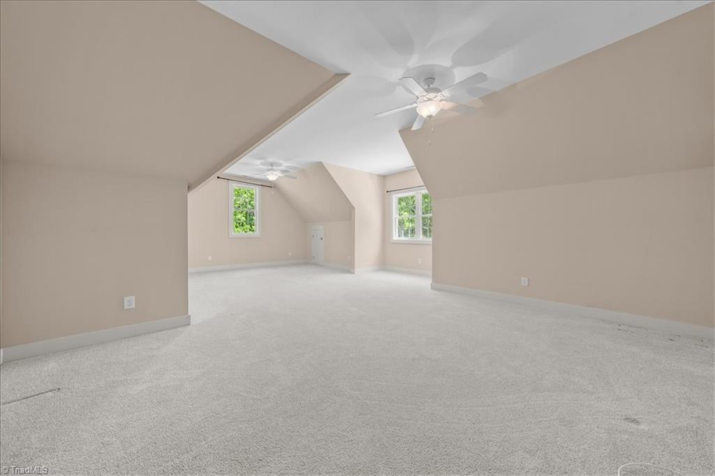 848 Sierra Trace Road Denton, NC 27239 - Photo 31 of 47 Spacious bonus room offering versatile living space for recreation, media, guests, or home fitness